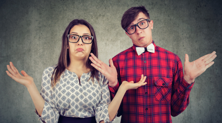 confused couple in dressy clothing