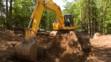 excavator digging a basement