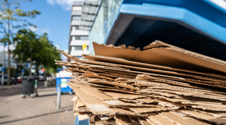 Flattened cardboard moving boxes