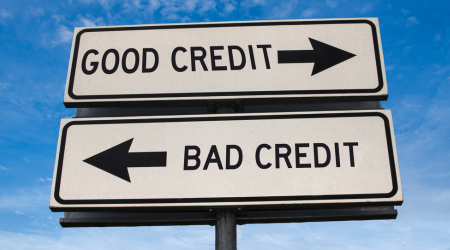 Street signs with arrows for good credit and bad credit
