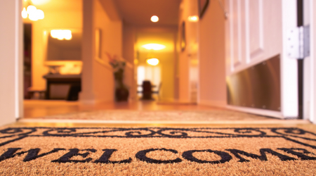 welcome mat with view into entryway